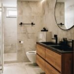 a bathroom with a large mirror