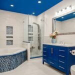 blue wooden cabinet near white wall